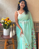 Soft green mulmul saree with delicate embroidery lightweight cotton saree