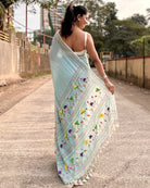 Handcrafted cyan mulmul cotton saree with artisanal embroidery