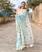 Lightweight cyan mulmul cotton saree with traditional hand embroidery