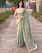Light green mulmul cotton saree with subtle embroidery work