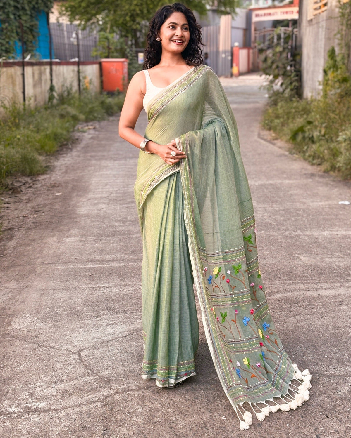 Light green mulmul cotton saree with subtle embroidery work