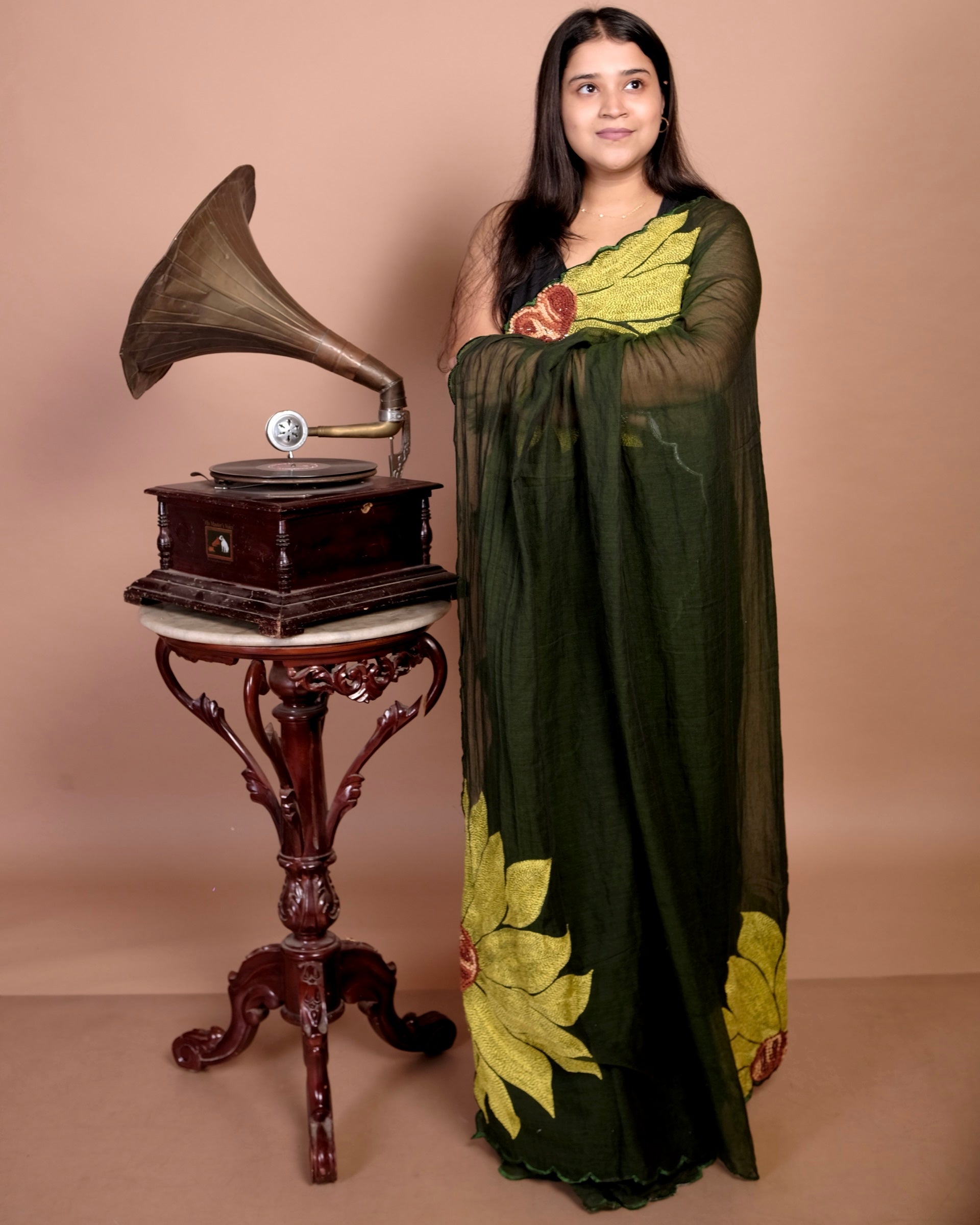 Bloom in the Wild green embroidered mulmul cotton saree, a lightweight breathable saree for summer styling and festive wear.