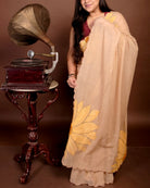 Lightweight beige embroidered mulmul cotton saree, designed for minimal elegance and all-day comfort.