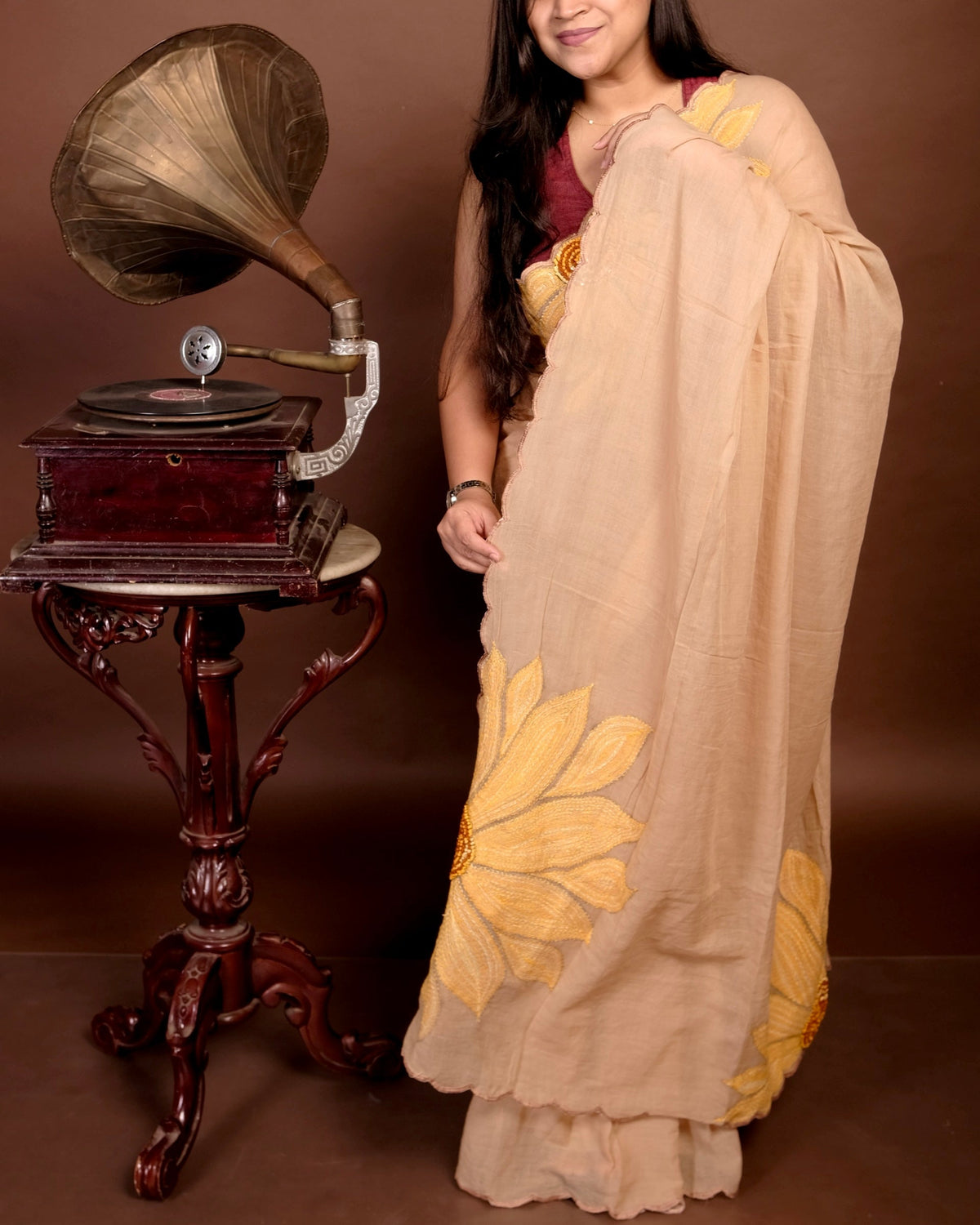 Lightweight beige embroidered mulmul cotton saree, designed for minimal elegance and all-day comfort.