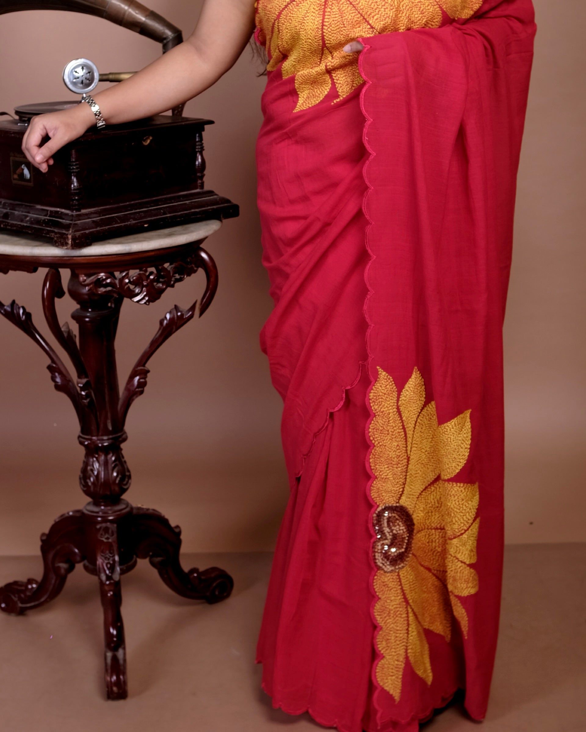 Soft and comfortable light weight red mulmul cotton saree with sunflower embroidery sequins embellished good for day time wear festive party wear