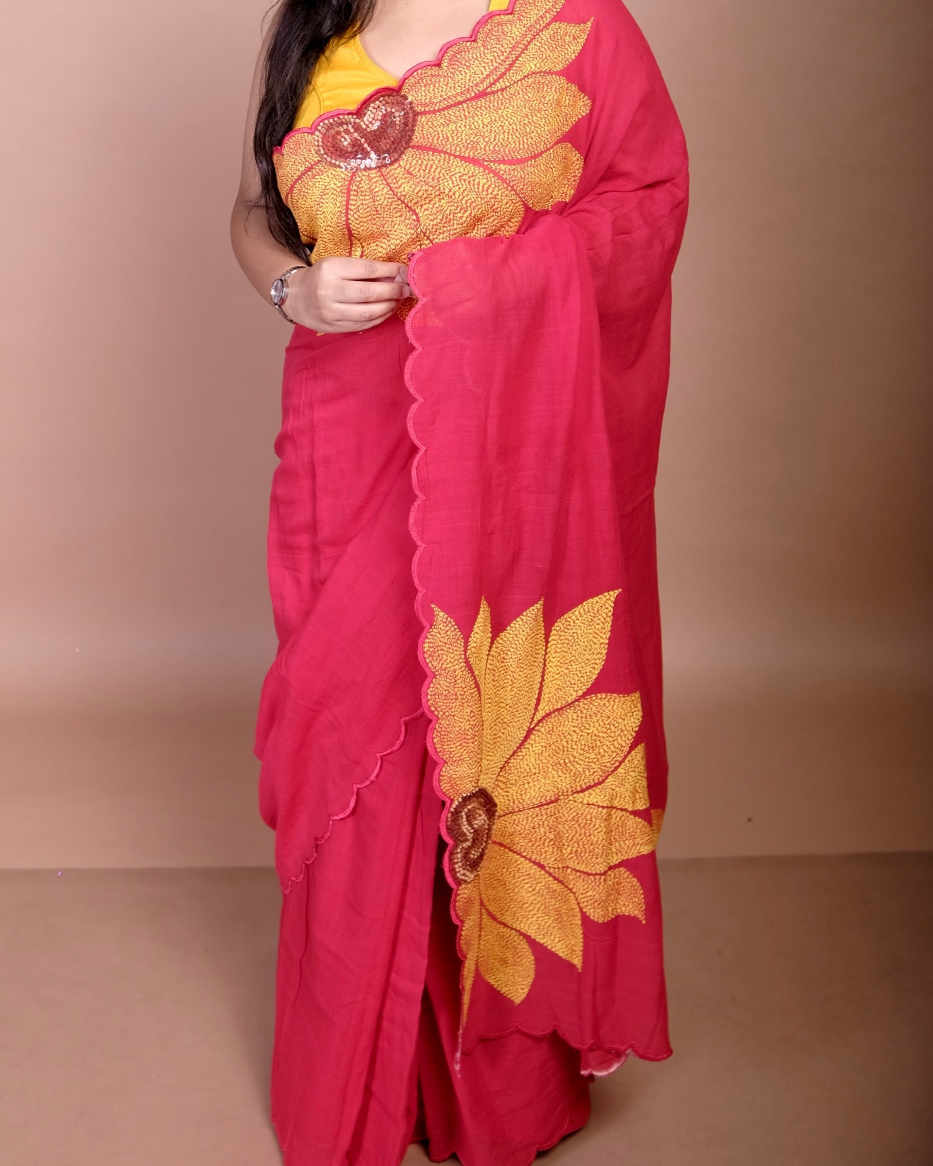Soft and comfortable light weight red mulmul cotton saree with sunflower embroidery sequins embellished good for day time wear festive party wear