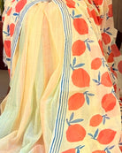 Soft & Comfortable off white mulmul saree with handblock print in orange and yellow mango aam pattern