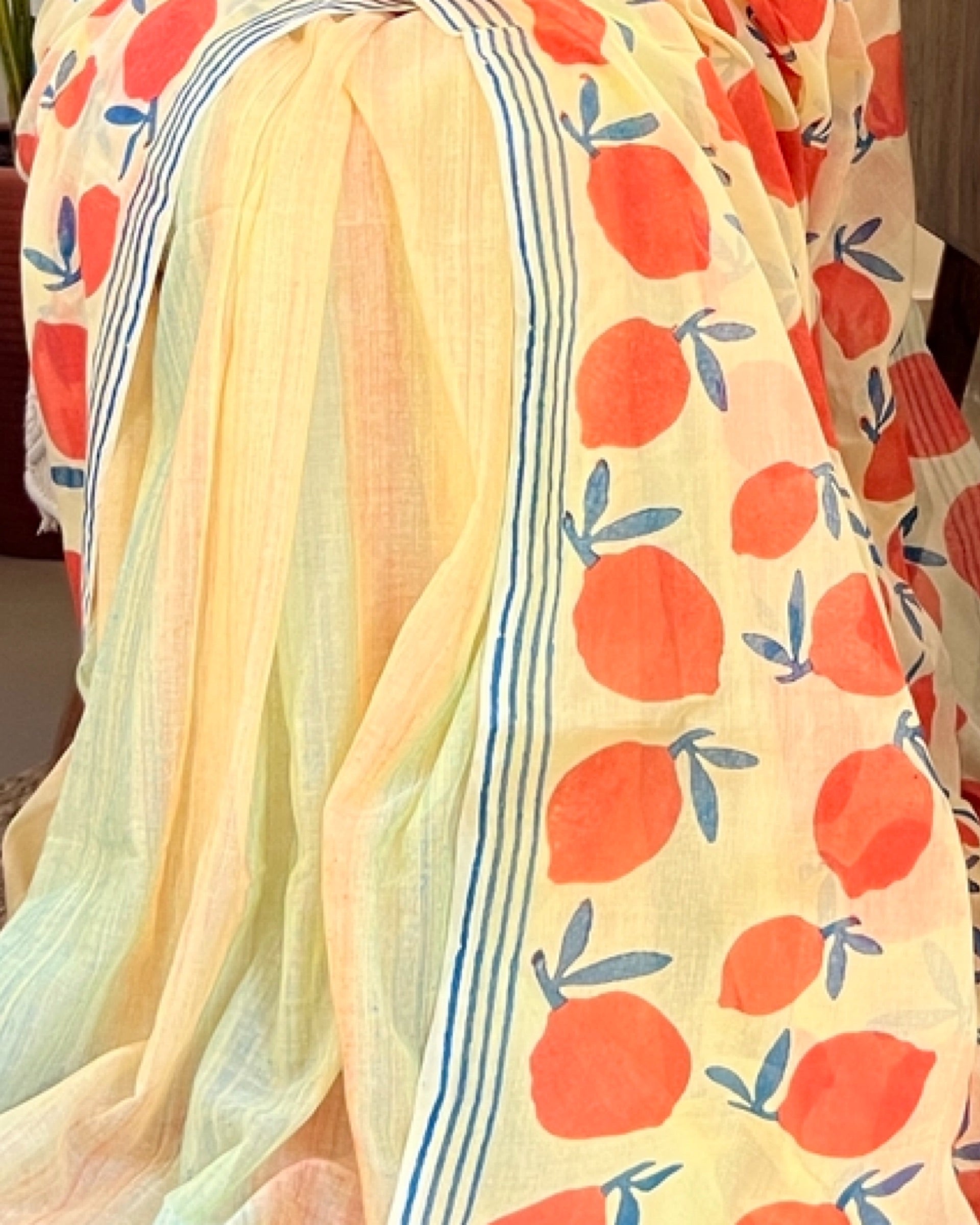 Soft & Comfortable off white mulmul saree with handblock print in orange and yellow mango aam pattern