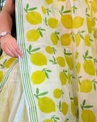 Soft & Comfortable white mulmul saree with handblock print in green and yellow mango aam pattern