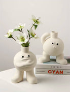 Big feet Flower vase hugging chest - https://artecasa.in/