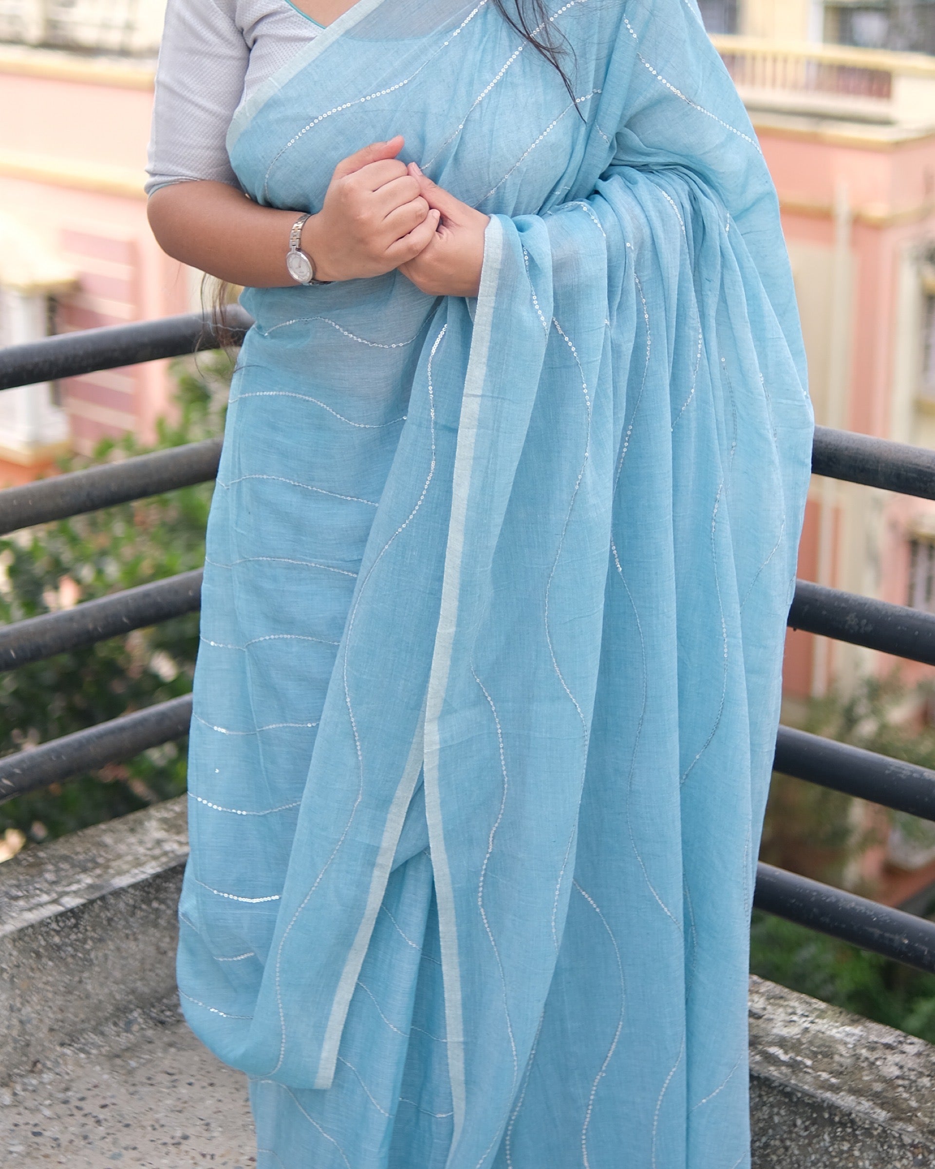 Soft and Comfortable mulmul cotton saree in sky blue shade with sequin emblishment for festive or party wear at reasonable price