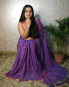 Soft and Comfortable mulmul cotton saree in dual tone purple violet and pink shade with sequin emblishment for festive or party wear at reasonable price