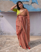 Soft and Comfortable mulmul cotton saree in dual tone peach and green shade with sequin emblishment for festive or party wear at reasonable price