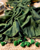 Soft and Comfortable mulmul cotton saree in green shade with golden sequin emblishment for festive or party wear at reasonable price