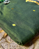 Soft and Comfortable mulmul cotton saree in green shade with golden sequin emblishment for festive or party wear at reasonable price