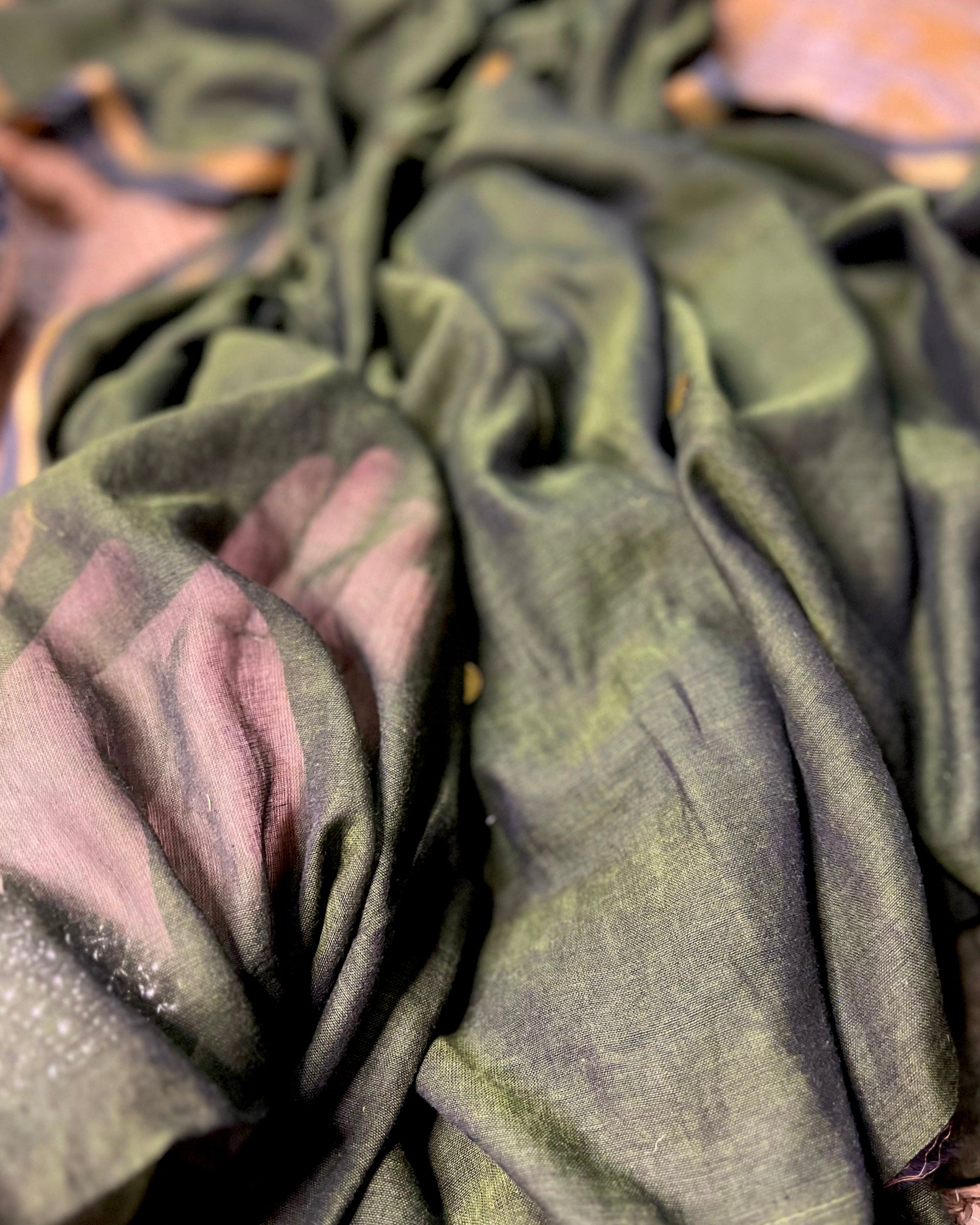 Soft and Comfortable mulmul cotton saree in green shade with golden sequin emblishment for festive or party wear at reasonable price