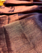 Viral Comfortable tissue saree in metallic golden and copper tones for festive or party wear at reasonable price