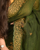 Soft and comfortable live green zari embroidered mulmul cotton saree