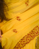 Harini Yellow Zari Embroidered Mulmul Cotton Saree perfect for festive occasions