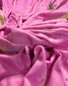 Soft and Comfortable mulmul cotton saree in powder pink shade with sequin emblishment for festive or party wear at reasonable price