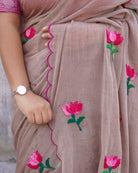 Lightweight embroidered mulmul cotton saree, designed for summer comfort with subtle elegant detailing.