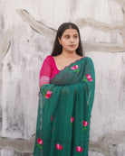 Lightweight embroidered mulmul cotton saree, designed for summer comfort with subtle elegant detailing.