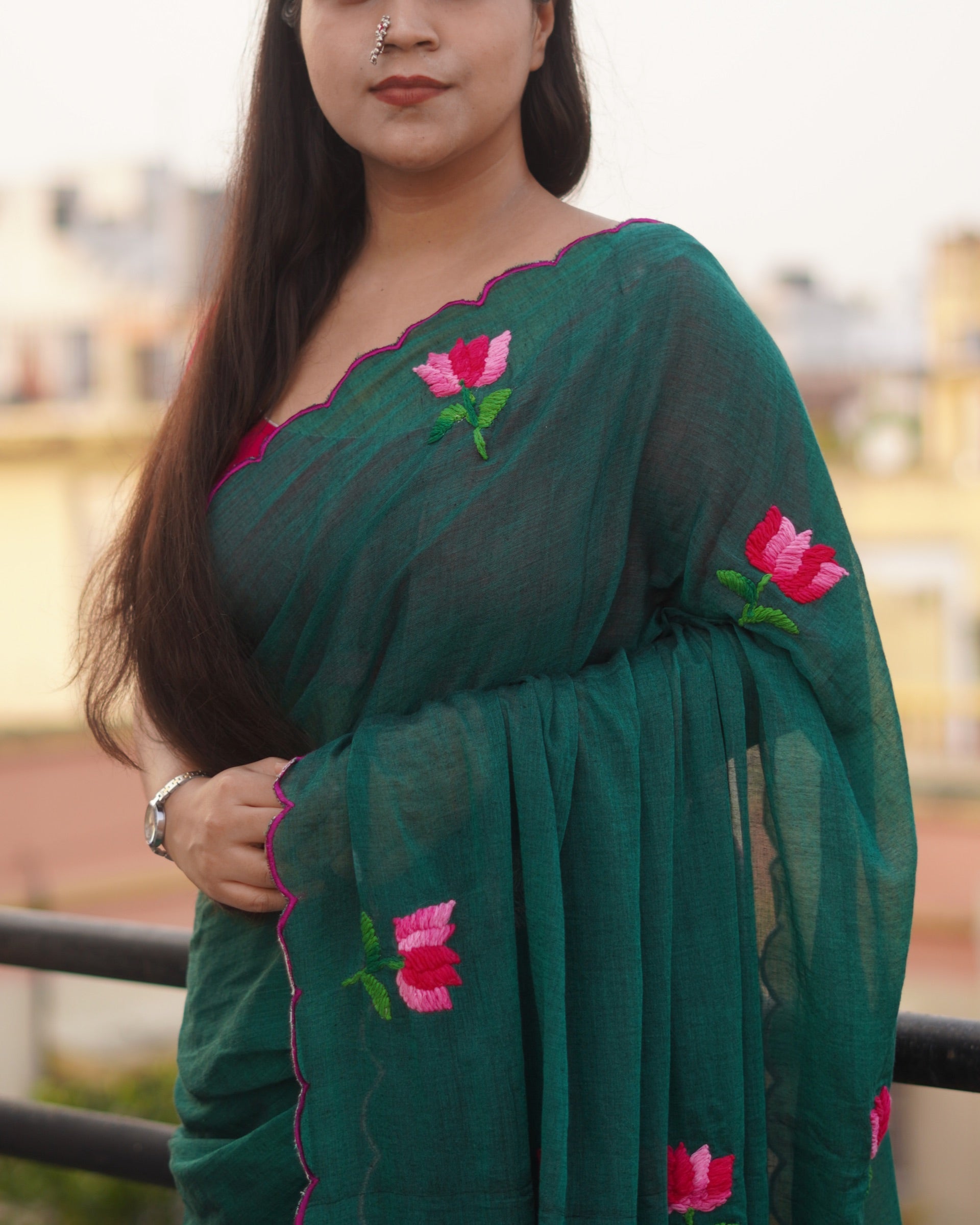 Mulmul cotton saree with delicate embroidery, soft airy comfort designed for effortless summer styling.