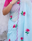 Mulmul cotton saree with lotus embroidery, soft airy comfort for summer styling and everyday elegance.