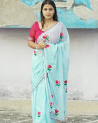 Lotus Ocean saree in cyan blue mulmul cotton, handcrafted elegance for summer styling and festive charm.