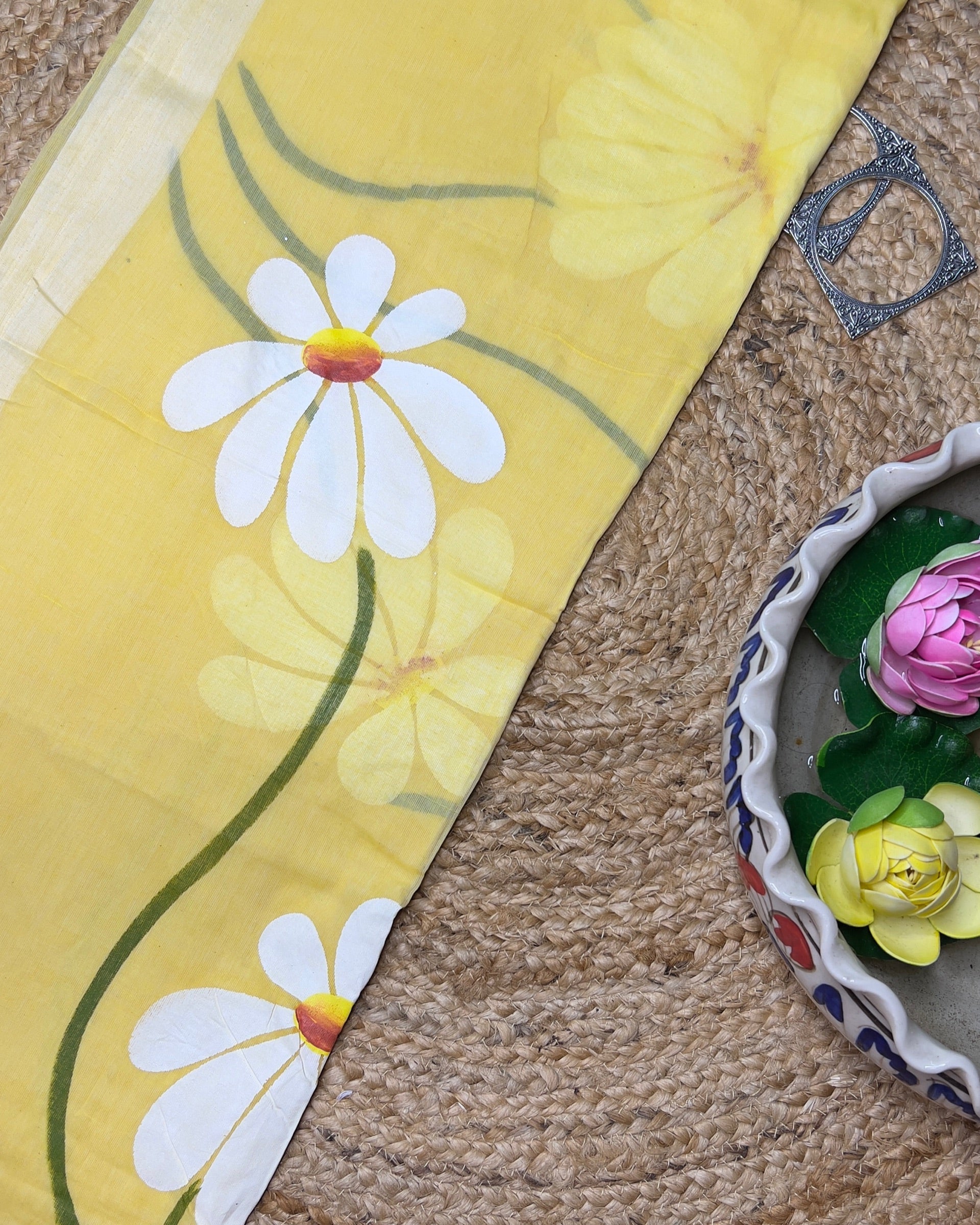 Soft and comfortable light weight lemon yellow mulmul cotton saree with floral hand painting good for day time wear