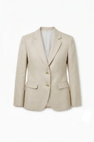 A beige linen blazer with two front flap pockets, a notch lapel, laid flat against a white background.