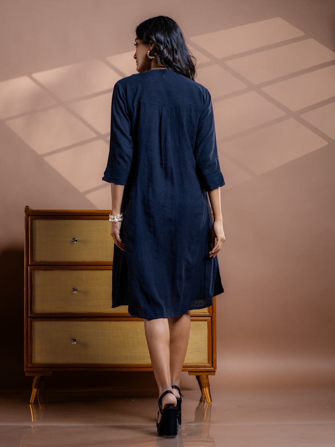 
Noir Fern black handwoven kala cotton, A-line dress, made sustainably in India.