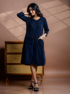 Black A-line summer cotton dress for women sustainably made in handwoven kala cotton. Hand embroidered and features crisp flat collar and roomy patch pockets. Plus sizes are available.