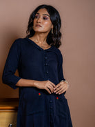 Embroidery detail of our Noir Fern black handwoven summer cotton dress in A-line silhouette is a must have tunic dress for every wardrobe. Sustainably made in India. Free shipping across India. We ship worldwide.