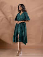 Ethically made ocean fern dress side view showcasing details of front slit and relaxed fit