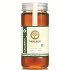 Bottle of Sundarban Forest Honey on a white background