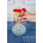 Mini glass bottle vase with red velvet bunch - https://artecasa.in/