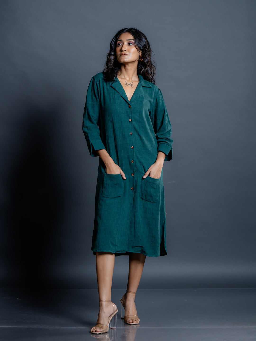 Teal green kala cotton long shirt dress for women with lapel collar and patch pockets and A-line silhouettes - front view