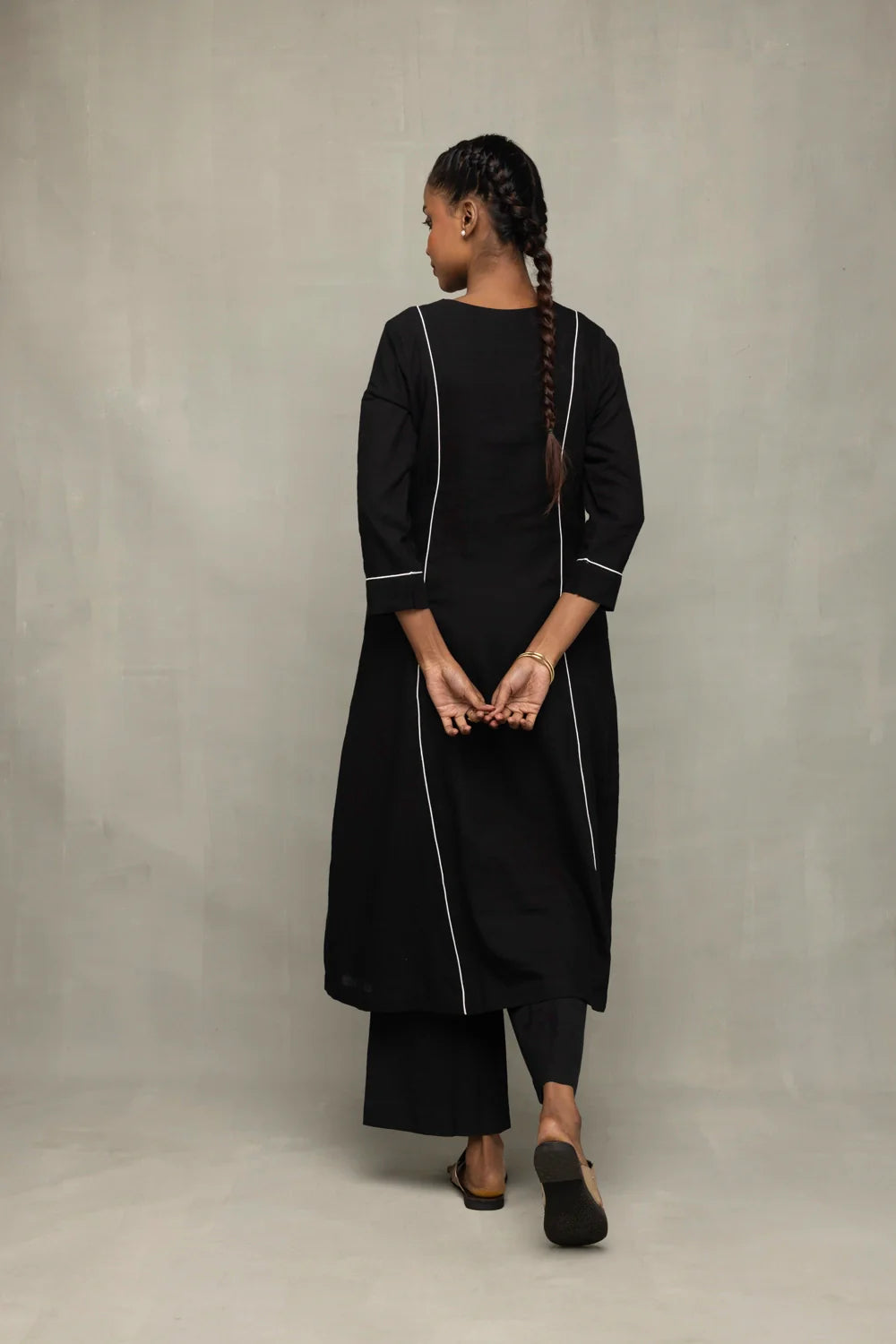 Back View of Black Relaxed Kurta Set with White Piping and Jamdani Dupatta
