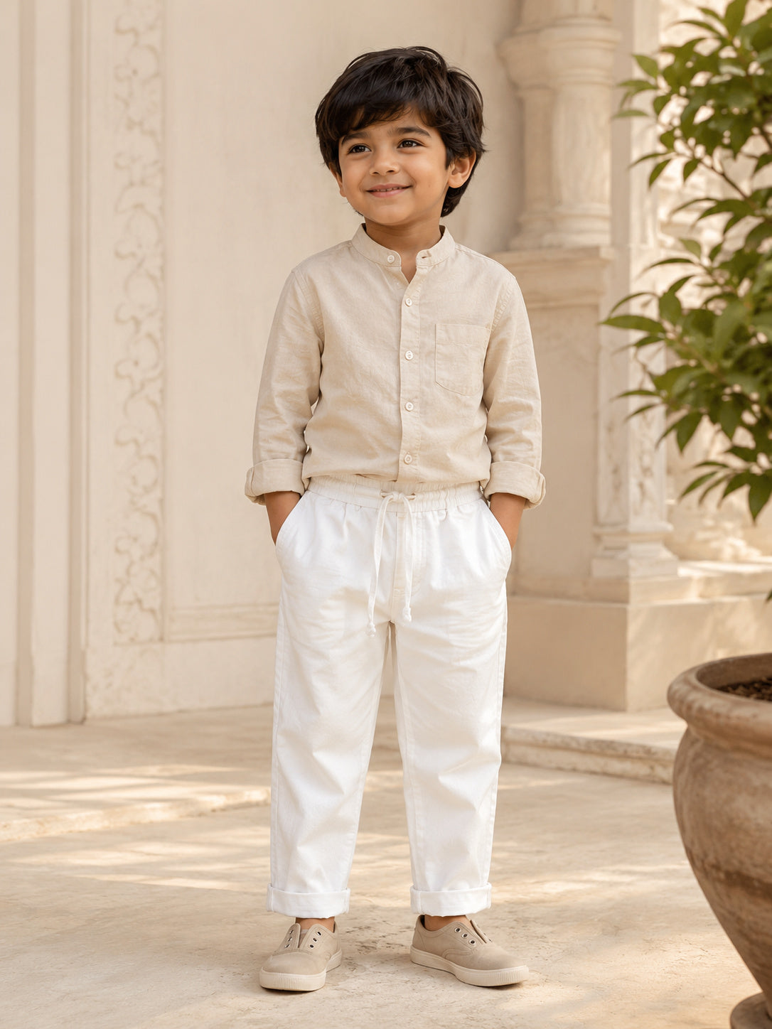 Positano Pants front view on child showing relaxed straight fit