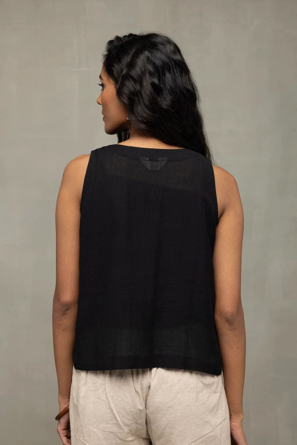 Close Up of Handwoven Texture on Noir Black Cotton Short Top