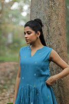Close Up of Jamdani Weave Motifs on Fern Green Dress