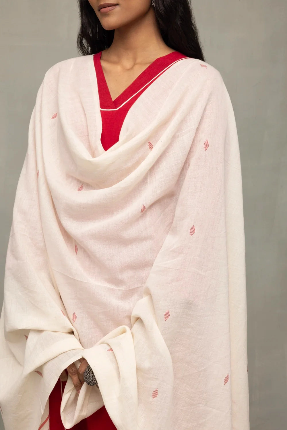 Close Up of Jamdani Weave Motifs on Red and White Handloom Kurta Set