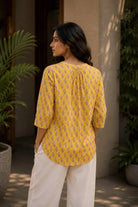 Close Up of Pink Floral Block Print Pattern on Yellow Pure Cotton Top