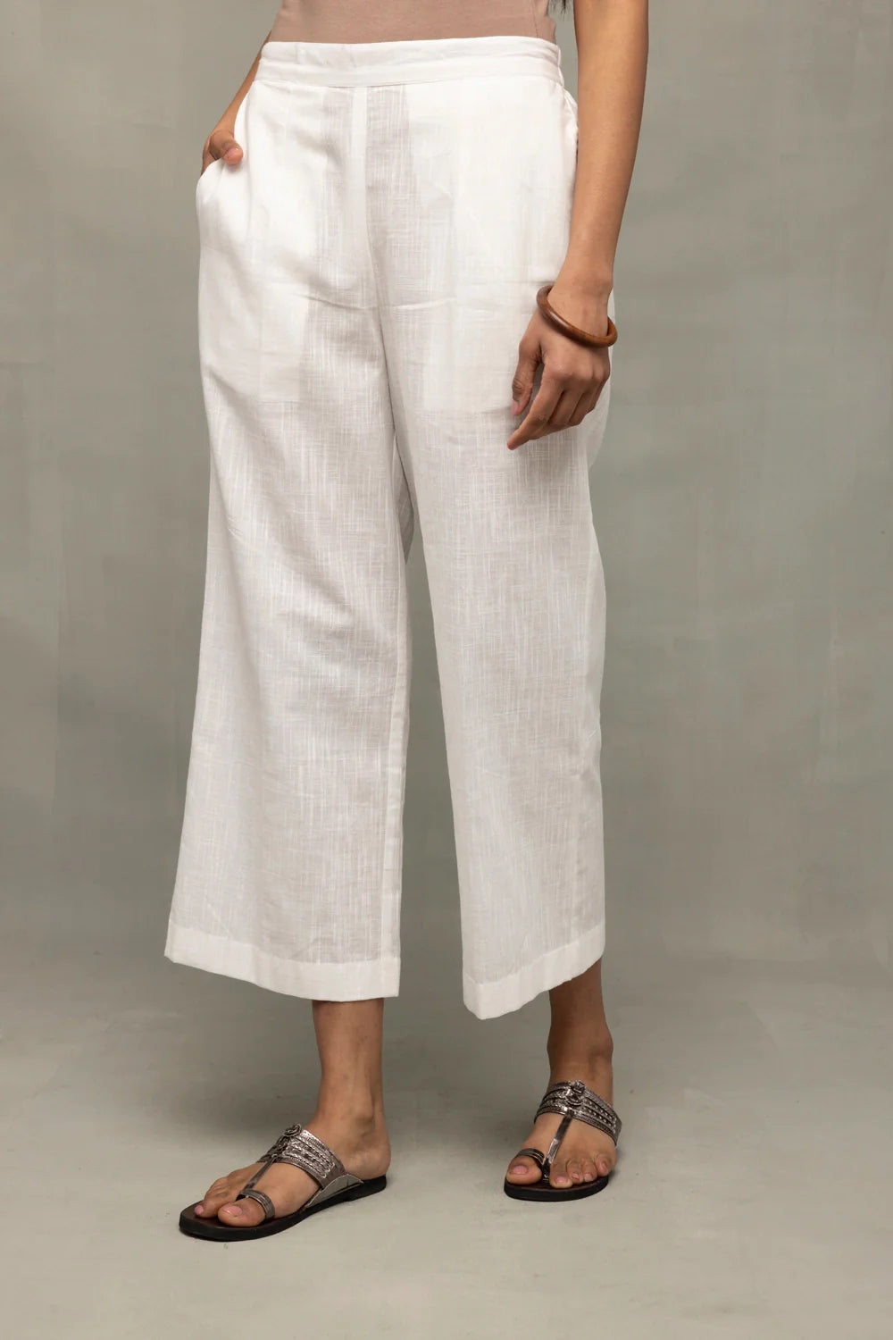 Close Up of Slub Cotton Texture on White Kurta Set