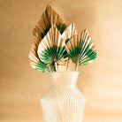 Golden green dual tone palm leaves used for aesthetic home decor and modern interior styling