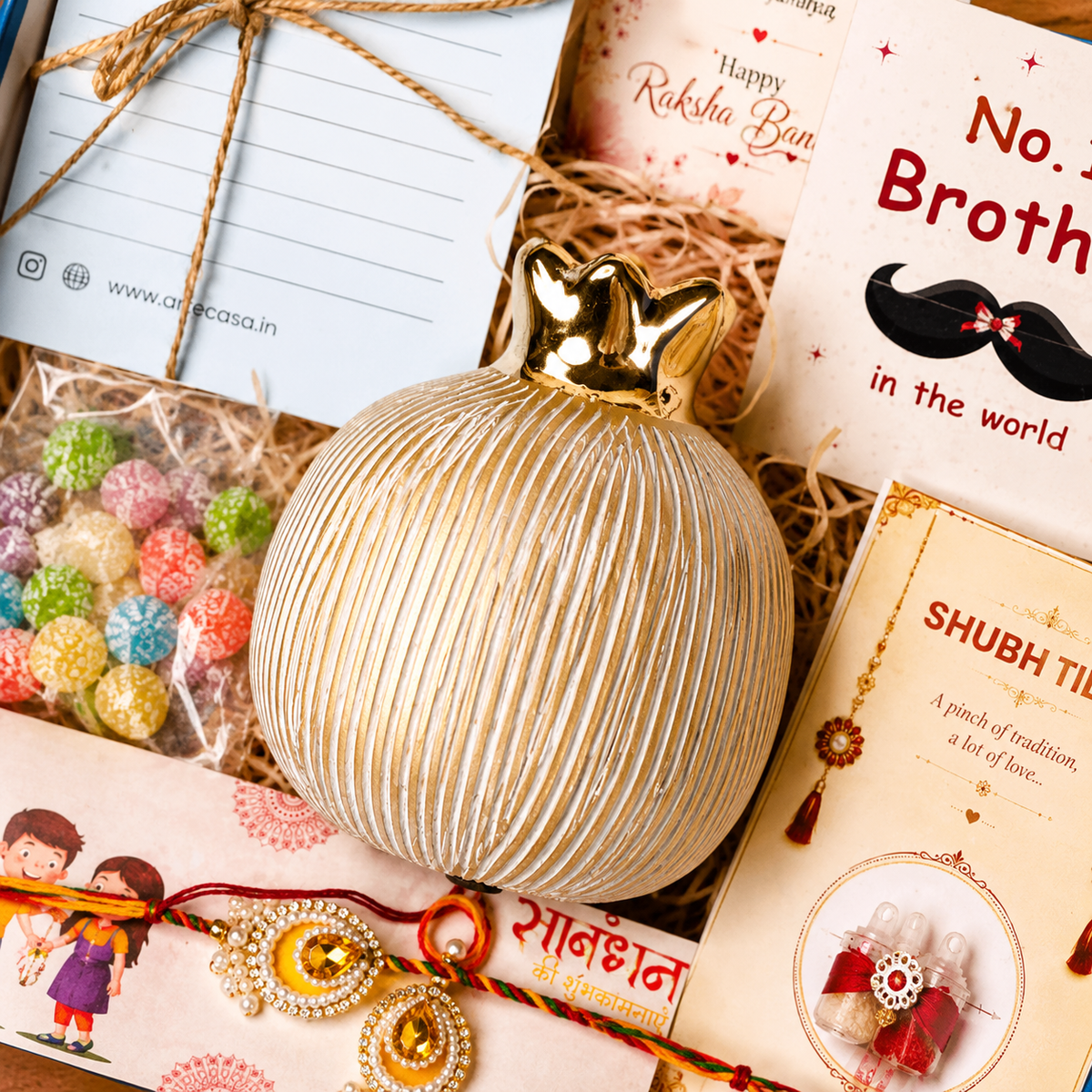 Artecasa Ivory Pomegranate Rakhi Gift Hamper for Bhai Bhabhi - https://artecasa.in/