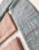 Close-up of embroidered linen scarf texture