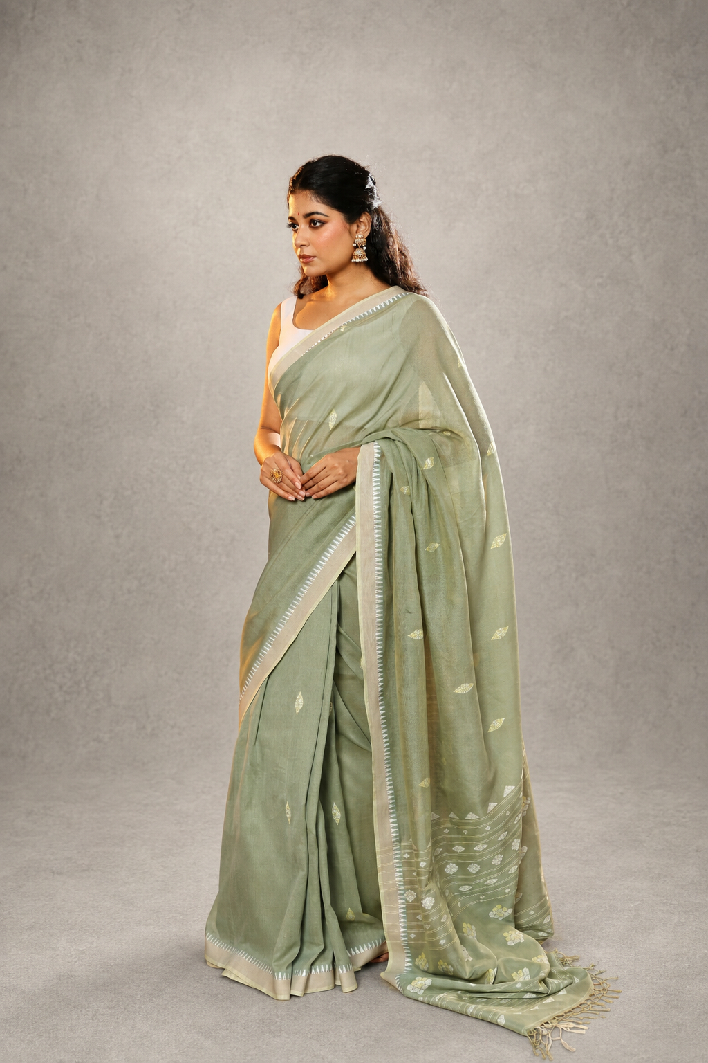 Handloom weave detail of pistachio green Jamdani saree