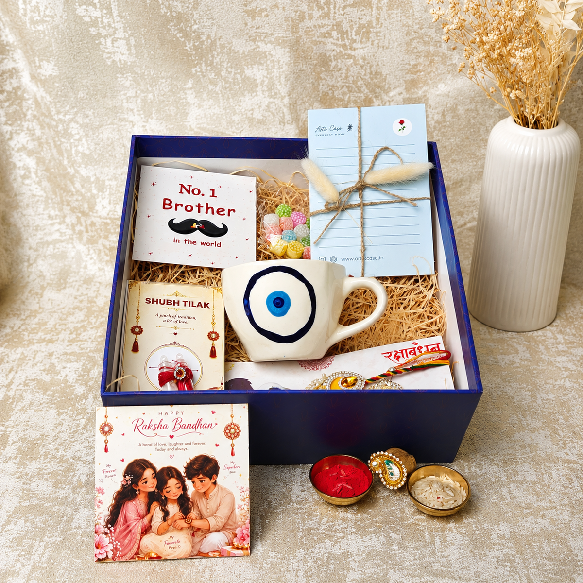 Artecasa Evil Eye Blessings Rakhi Hamper | Premium Bhai Bhabhi Raksha Bandhan Gift Hamper - https://artecasa.in/
